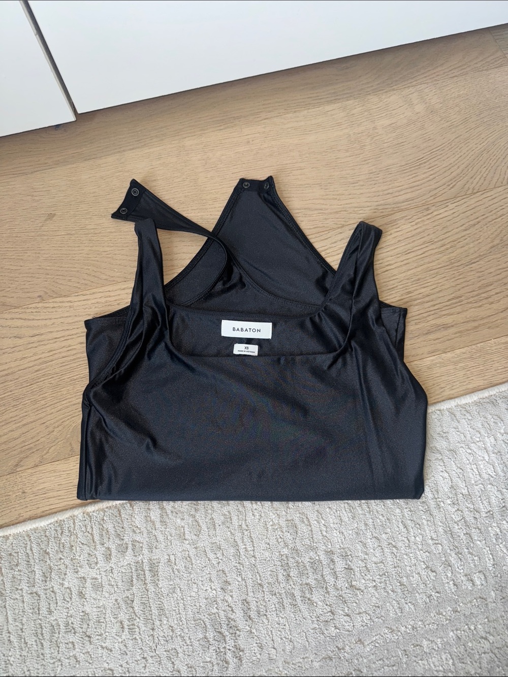 Babaton Black Seamless Tank Bodysuit with Snap Back
